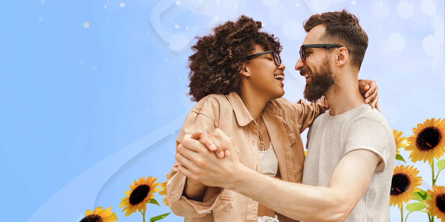 Young couple dancing together in the Summer